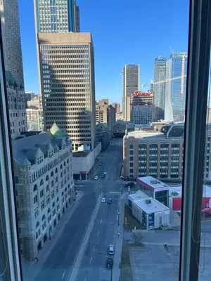 a view of a street in a city with buildings at Beautiful one bedroom downtown Condo with pool and free parking in Montréal